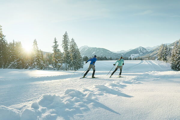 Enjoy the snow-covered landscape in Ramsau while cross-country skiing